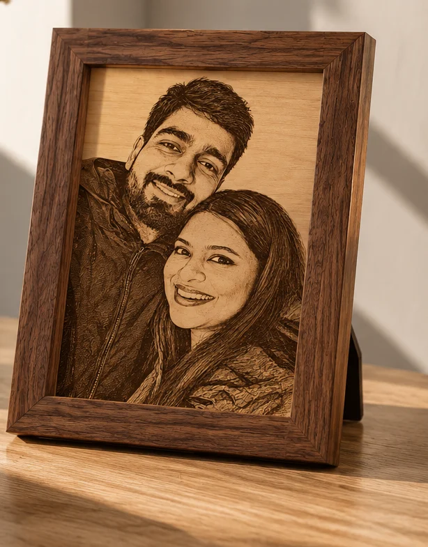 A couple&rsquo;s photo laser-engraved on wood in a walnut frame